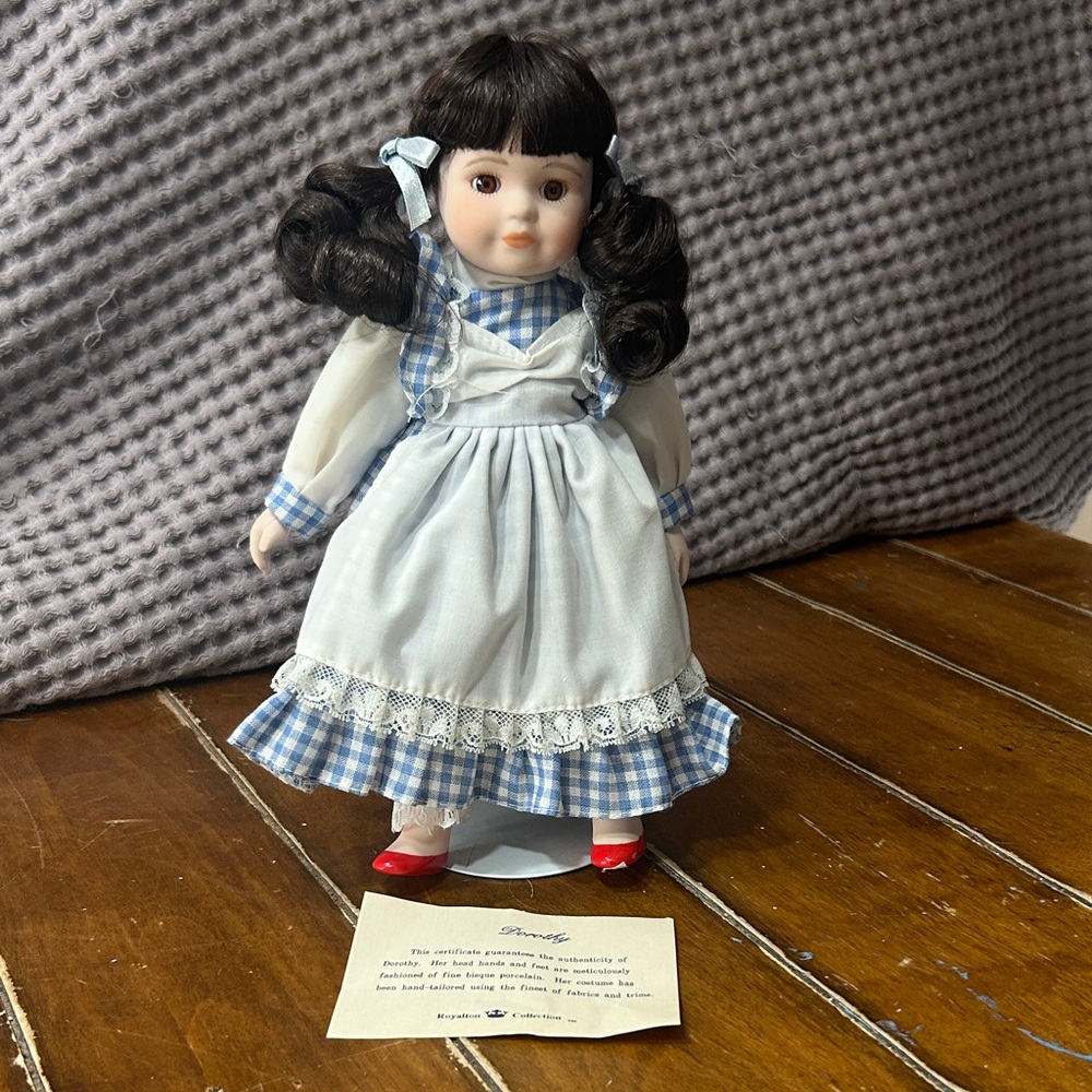 Royalton Collection Porcelain Dorothy Doll with Traditional Clothing- Vintage